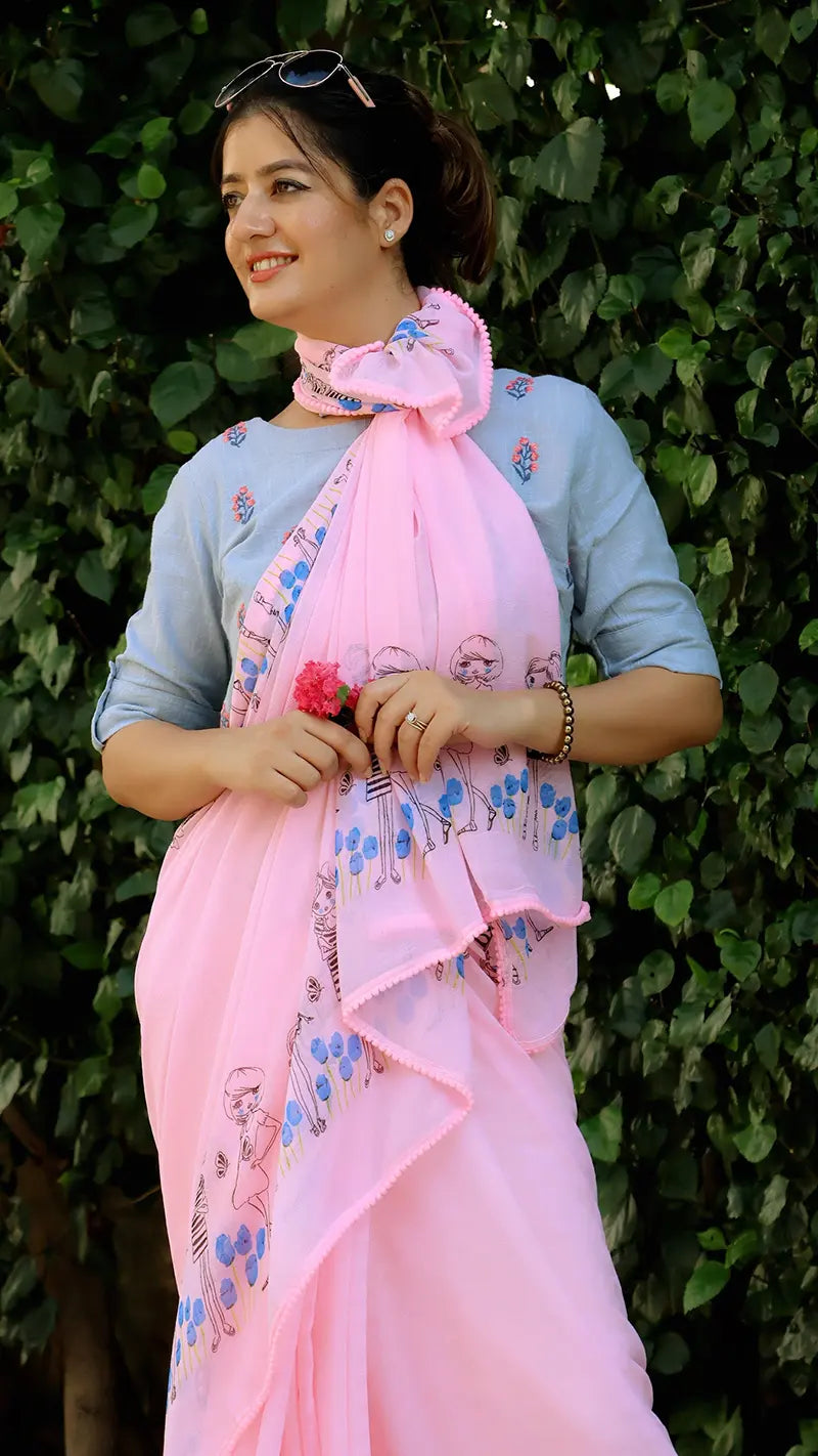 Woman holding a pink embroidered scarf against a green leafy background